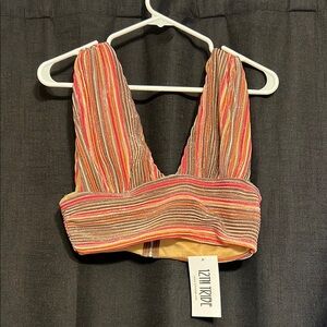 Orange Striped Sleeveless Tank Top with Deep V-neckline and Cropped Fitted Style